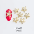 Detailed macro view of starfish nail charm with rhinestones and pearl, size 12x12mm - Gold Rhinestone Starfish Pearl Style (5057)