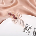 Elegant rose gold bow brooch with purple crystals and cat-eye stones for women - Purple Crystal Bow