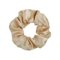 Elegant champagne gold satin scrunchie with silk luster and elastic pleated design - Light gold