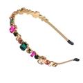 Close-up of golden metal headband with colorful rhinestones in pink, green and amber - Multi-color Rhinestone 2