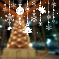 White Christmas window decals featuring snowflakes, angels, and stars for holiday decor - 0991 White Snowflake Angel Clings