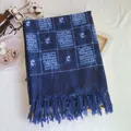 Macro detail of indigo tie-dye checkered scarf with traditional floral patterns and tassels - Indigo Lattice & Floral (2020-1-12)
