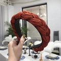 Braided padded headband for women in reddish brown pleated fabric with twist design - Brick Red