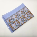 Close-up of lilac cashmere shawl with colorful floral embroidery and fringe details - Lake Blue 450g