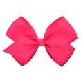 Detailed texture of hot pink grosgrain ribbon on a symmetrical double-layered hair bow - Rose Red