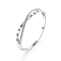 Elegant silver crossover bangle featuring Roman numeral engravings and sparkling rhinestones - Silver Roman Numerals Cross Style (7259)
