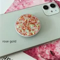 Detail of rose gold foil and glitter embellishments on a round expanding phone stand - Expanding Stand / White Base Rose Gold Foil