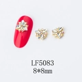 Detailed macro view of 8x8mm gold flower nail art charm with AB colorful rhinestones - 5083 Iridescent White