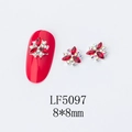 Detailed view of 3D metal flower nail art charms with red rhinestones in 8x8mm size - 5097 Bright Red