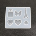 DIY silicone mold for resin pendants featuring perfume bottle butterfly and heart shapes - Tower & Diamond Pendant Style