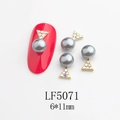 Detail of grey pearl and gold triangle nail charms with 6x11mm size and LF5071 model - 5071 Grey Pearl Triangle Style