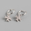 Detail of silver S925 cross hoop earrings with sparkling cubic zirconia stones - One Pair / White Gold