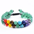 Detailed macro view of seven chakra double-layer woven bead bracelet with colorful stones - Green Strawberry Quartz Double Row Bracelet