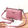 Pink lychee texture leather crossbody bag with three layers and metal logo - Dusty Pink