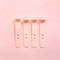 Pink silicone cord organizers set of 4 adjustable cable ties for earphones - Set of 4 / Pink