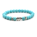 Turquoise beaded stretch bracelet for men featuring a vintage silver elephant pendant charm - Turquoise