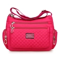 Pink nylon crossbody bag for women featuring classic quilted patterns and adjustable strap - Rose Red