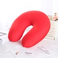 Detail of red travel U-shaped neck pillow with soft fabric and foam bead filling - Red
