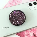 Detail view of a circular purple foil glitter popsocket on a green smartphone case - Expanding Stand / Black Base Purple Foil