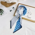 Blue and white double-sided polka dot silk scarf tied on a woven handbag handle - Blue White Polka Dot