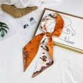 Orange and cream floral silk scarf styled with a woven clutch and elegant accessories - Orange White Double Floral