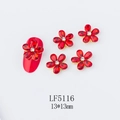 Macro view of red 3D flower nail charm with white crystal and gold alloy base - 5116 Bright Red