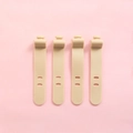 Pack of four flexible beige silicone cable ties with adjustable button closure for wire storage - Set of 4 / Brown