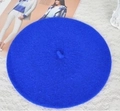 Detailed close-up of Klein Blue wool beret hat texture on white lace background - 52-54cm / Royal Blue