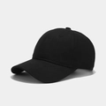 Detailed view of black cotton baseball cap showing six-panel stitch and curved brim - Adjustable / Black