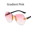 Children's rimless geometric sunglasses featuring gradient pink lenses and gold metal accents - Gradient Pink