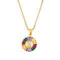 Detail of 18K gold letter S pendant with multi-colored gemstones and cubic zirconia - Gold S