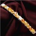 Elegant gold metal hair clip with amber and white crystal stones on dark velvet background - Hair Clip (3175) / Champagne