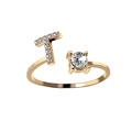 Adjustable gold letter T ring featuring sparkling diamonds and a round cubic zirconia - Letter T