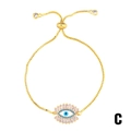 Adjustable golden box chain bracelet featuring an Evil Eye pendant with blue enamel and zircons - Evil Eye (brb53-C)