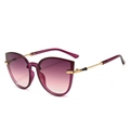 Cat eye sunglasses with purple gradient lenses and gold metal temples on white background - Purple Frame Purple Pink Lens