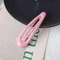 Minimalist pink water drop shaped metal hair clip with a glossy finish for women - Peach Pink