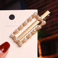 Close-up of elegant gold rectangular hair clip with white pearls on a display card - Alloy Rectangular Pearl Duckbill Clip