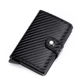 Detail of carbon fiber texture and automatic pop-up button on minimalist wallet - Carbon Fiber Black