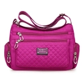 Elegante borsa a tracolla in nylon rosso rosa con motivi trapuntati e tasche a zip - Viola Rosa
