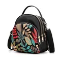 Waterproof black nylon handbag featuring colorful leaf print and multi-zipper pockets - Leaf