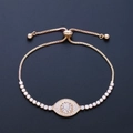 Adjustable evil eye charm bracelet in gold finish with micro-pave AAA zircon crystals - Gold