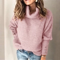 Detalle del jersey rosa de cuello alto con botones metálicos en los puños acanalados - S / Tops / Rosa