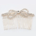 Golden hair comb with sparkling rhinestones in a delicate bow shape for hair styling - Bowknot Style (8833) / Gold