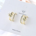Double-layered gold star earrings featuring shimmering zircon pave in a Korean style - Copper / Gold