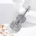 Elegante spilla a violino argento con strass trasparenti e dettagli di strumenti - Argento