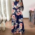 Donkerblauwe maxi-jurk met bloemenprint, lange mouwen en strikceintuur in spiegelbeeld - S / Blauw