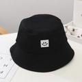 Black cotton bucket hat for children with a minimalist smiley face patch for sun protection - Black