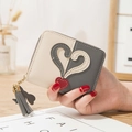 Short zip wallet for women in beige and grey patchwork with a cute heart tassel charm - Gray