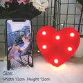 Mini red heart LED night light with 6 warm white bulbs on soft white fur base - Red Heart