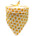 Detail of cream cotton dog bandana featuring cute yellow duck patterns and neat stitching - Duck